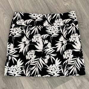 Black and white golf skirt.